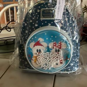 Cute Mickey and Minnie as snow people Loungefly backpack
